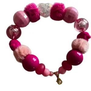 Pink Fuzzy Beaded Phone Wristlet – Cute & Girly Handmade Charm .Level up your phone game with this adorable pink beaded wristlet, featuring a mix of fluffy pom-poms, glossy beads, and an iridescent heart charm! The perfect blend of soft, playful textures