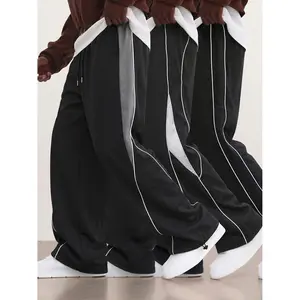 3-pack men’s trendy sports straight-leg pants for spring/autumn, side gray contrast color paneling, urban street fashion versatile casual trousers, lightweight polyester fabric, suitable for everyday workouts.