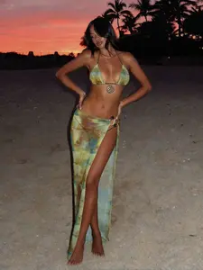 Retro Women's Tie Dye Print Backless Hanging Neck Triangular Cup Tie Bikini Dress, Decorated With Circular Metal Pendant On Chest, Paired With Blend Pattern Mesh Half Skirt, Birthdays, Wedding, Swimsuit For Beach Swimwear