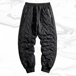 A black cotton pant with an overall casual design The pants feature a quilting process with a unique textured pattern on the surface, not only adding visual dimension but also helping to hold the padding in place to some extent, enhancing warmth.