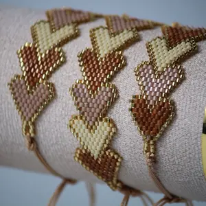 Handcrafted Beaded Heart Bracelet Unique Design for Women in Soft Beige and Gold Colors