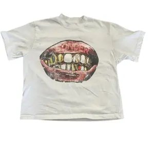 Y2K Sonder Worldwide Grillz Graphic T-Shirt - Vintage Graphic Tee – Menswear & Womenswear – Streetwear Tops – Casual Cotton Crewneck Shortsleeve T-shirt