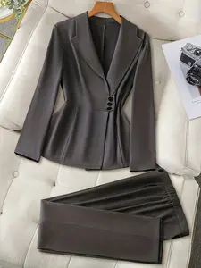 Women's dark gray Long Sleeve suit jacket with a fitted waist and elastic waist pants set, styled in a simple, Chic, casual workwear look, suitable for daily commuting and at-home leisure.