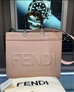 Pre-owned FENDI calfskin leather tote bags New Sunshine Tote Medium Nude Pebbled Leather with strap