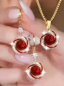 A 3-piece elegant jewelry set for women, including a necklace and earrings, with creative flowers inlaid with faux pearls and rhinestones. It is a fashionable item suitable for daily life, parties and casual occasions, as well as a birthday gift.