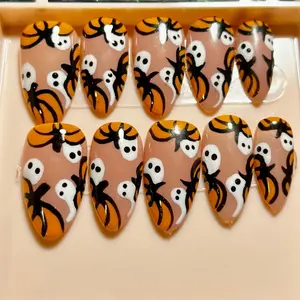 Spooky Season press on Nails with Pumpkin and Ghost Designs for the Halloween Season!