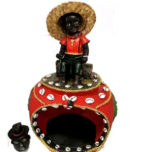 Casa de Elegua Yoruba Religion Orisha House with Traditional Hat and Red Shell Decor