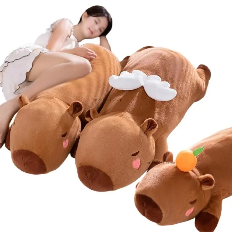 Giant capybara plush toy, with angel wings and heart-shaped cheeks, orange decoration, capybara nap pillow