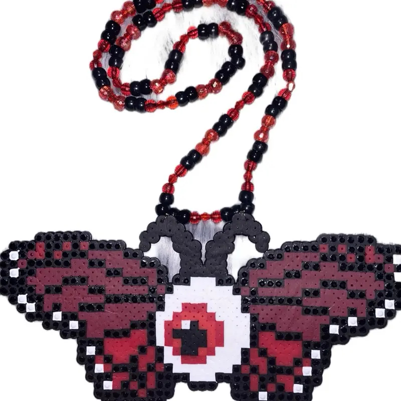 Cyclops butterfly bedazzled Perler necklace