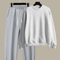 Gray pants light gray sweater