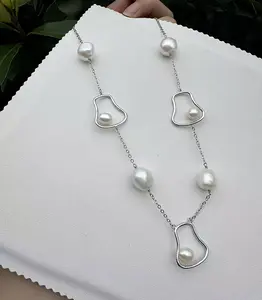 NC039-Pearl Necklace with Unique Silver Charms and White Pearls