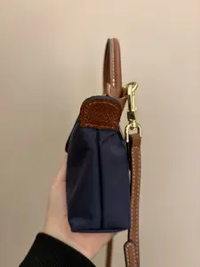 Mini crossbody bag for commuting – made of theft-proof and waterproof nylon, it can hold an iPhone 15 + wallet + keys, with a secure zipper and adjustable shoulder strap| TikTok made me buy it.2026 Spring Collection.MinimalistBag .EverydayEssentials
