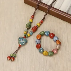A 2-piece set of colored ceramic necklace and bracelet, heart-shaped necklace and bracelet combination, a must-have for dopamine-style daily accessories and outfits