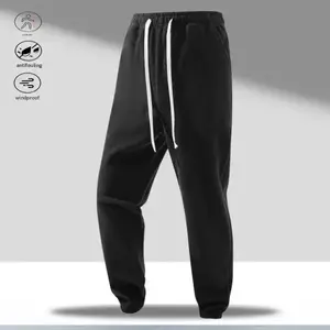 A double sided fleece jogger pant with a simple and comfortable style that leans casual and versatile. The pants feature an adjustable drawstring waistband, allowing for a snug fit according to one's body shape, providing comfort and freedom of movement.