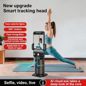 360° Al face tracking rotatable phone holder with charging and Bluetooth remocontrol. It auto-follows your face for hands-free shooting. You can add extrabrackets and fill lights as needed. Great for vlogging and live streaming。