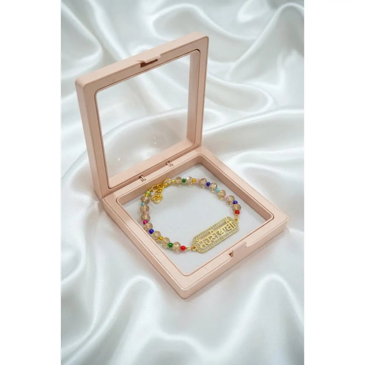 Sohni Bhabhi Rakhi - Elegant Bracelet with Colorful Beads and Gold Plated Charm in a Pink Gift Box