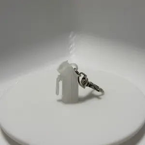 Urinal badge keychain