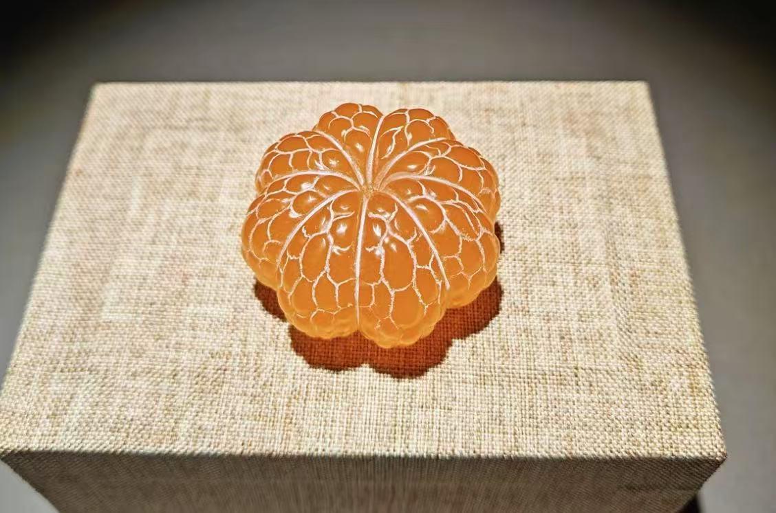 Oriental Gold Frozen Stone ornament, handheld piece, spinning craft item, souvenir gift, stress-relief spinning, hanging decoration, orange ornament