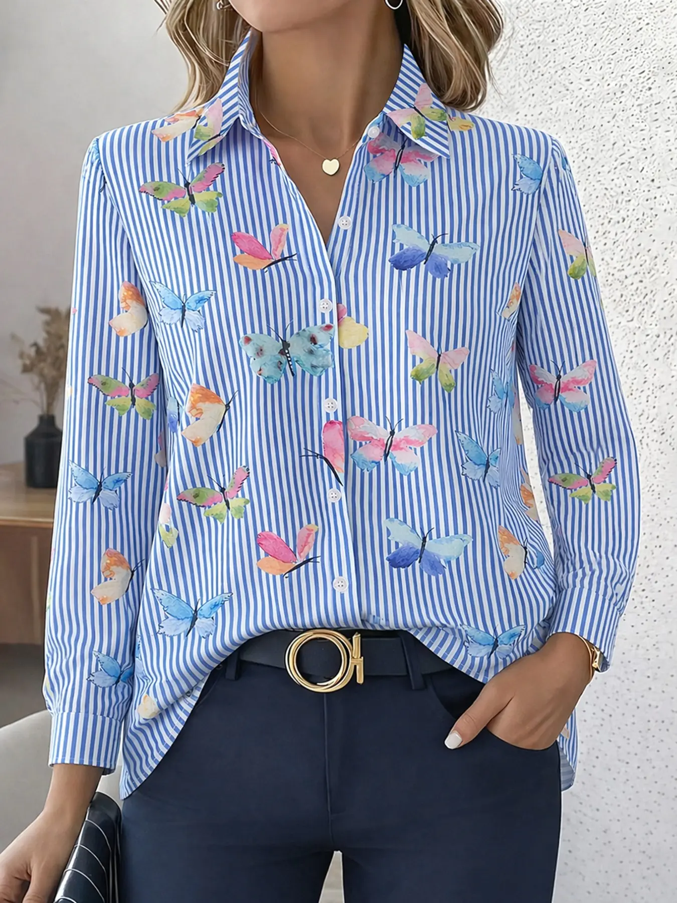 Women's long-sleeved button-down casual fitted Collared Blouse shirt with butterfly and Striped print design. A casual everyday top, stylish and comfortable women's shirt.
