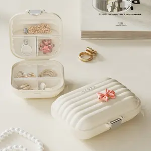 1-Piece Set: Exquisite Mini Travel Organizer - Cream-Colored Striped Pillbox Jewelry Box - Portable Micro Storage Case, Supplement Organizer, Ideal for Vitamins, Earrings, and Wallets