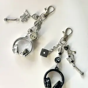 2pcs Ins Style Music Headphone & Butterfly Charms Bag Keychain Phone Chain Unisex Backpack Pendant for Women Men, Ideal Gift for Couples Best Friends