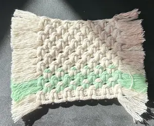 Cream with a mint green stripe macrame mug rug