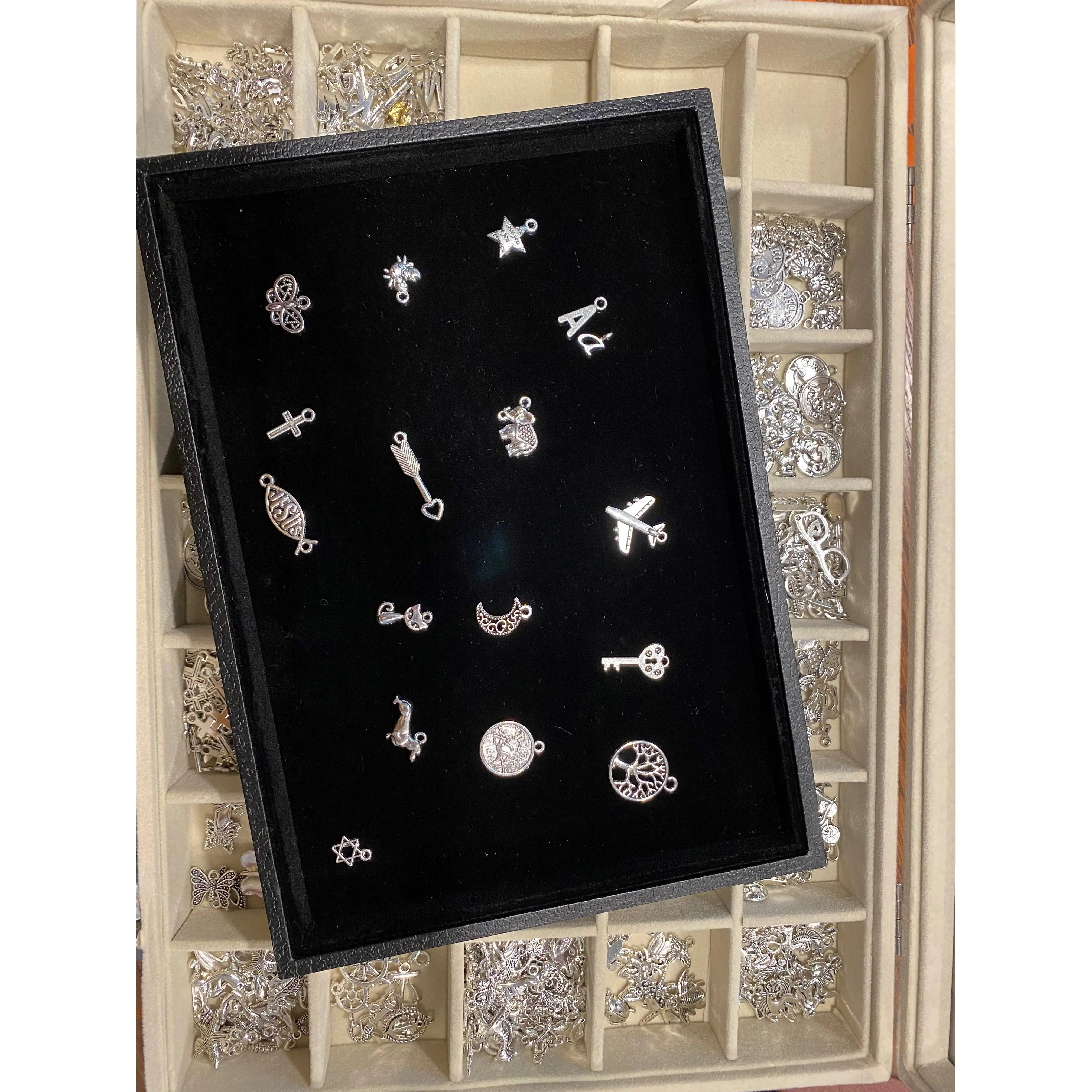 Add personality to your jewelry with mixed charms - enameled and birthstone options for bracelets, anklets, and necklaces