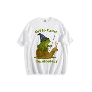 Whimsical Green Frog Riding Brown Snail Cartoon T-Shirt - Blue Wizard Hat & Wooden Staff, Off to Cause Tomfoolery Text, Lighthearted Casual Crew Neck Cotton Tee for Kids Adults Fans