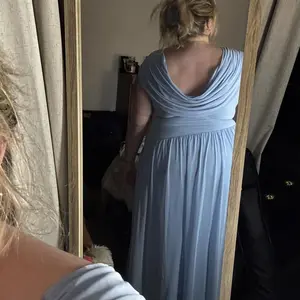 Customer wearing the Athena Gown