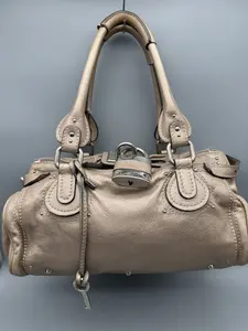 Pre-owned Chloé Leather Shoulder Bags Chloe Argent Paddington Satchel Handbag in Luxurious Gold Finish with Secure Silver Lock and Key Feature for Stylish Security