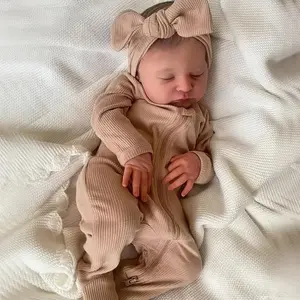 Handcrafted 19-inch lifelike doll with hand-painted hair and 3D light brown skin - soft to the touch, expressive eyes and closed mouth, brown outfit with bow tie - for kids birthday/Christmas, silicone baby dolls mold mouth