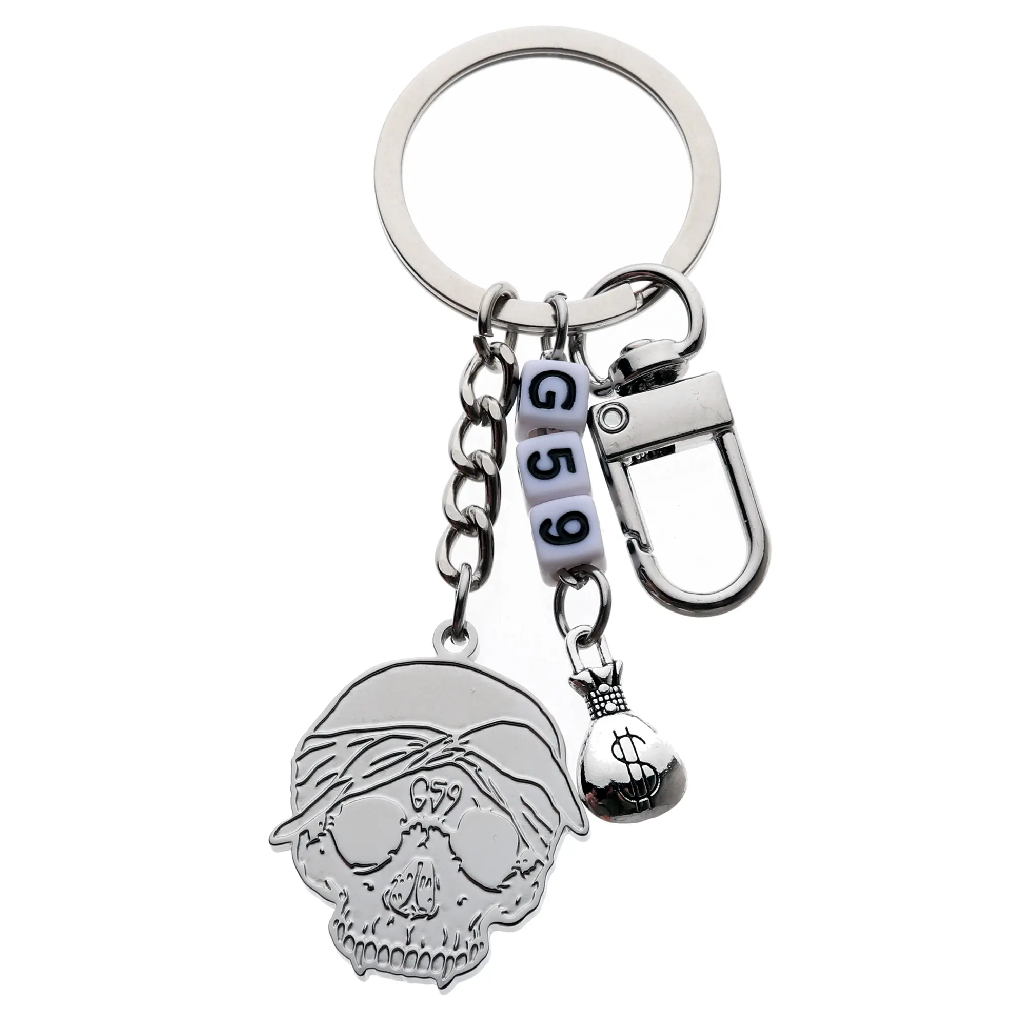 stussy skull keychain - TikTok Shop