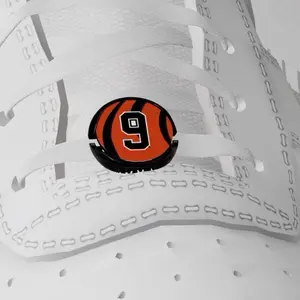 Custom Sneakerplates Golf Ball Marker - Attach magnetic golf ball marker to the laces of any golf shoe. Add your custom logo or design.