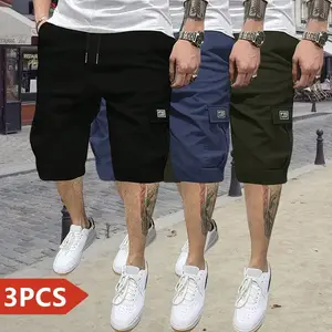 Men’s three-piece set featuring black cargo shorts in navy olive tones, a classic Japanese tropical-style solid-color pocketed outfit suitable for everyday streetwear.