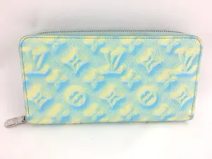 Pre-owned Louis Vuitton leather Small Leather Goods Monogram Empreinte Summer Stardust Zippy Wallet