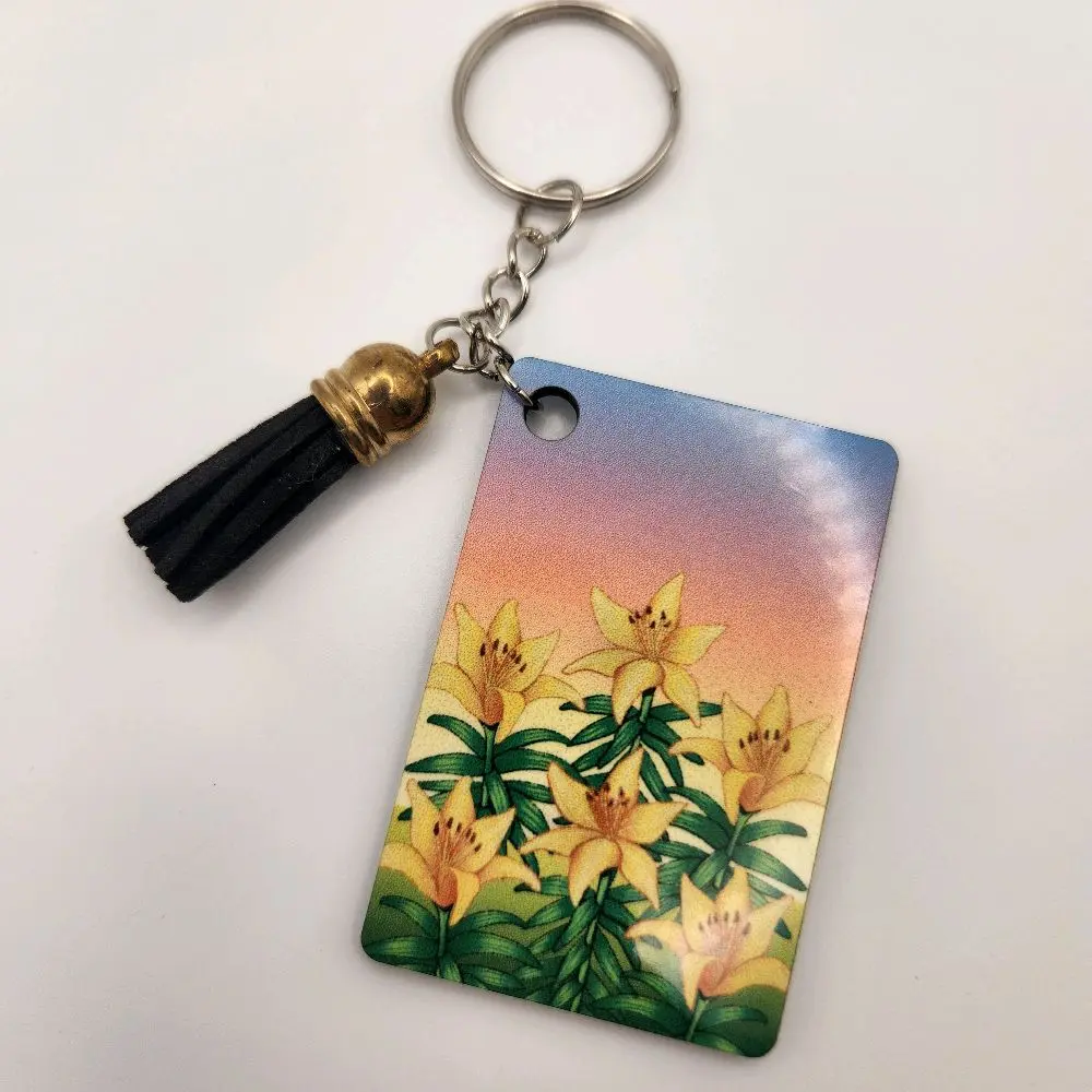 Yellow Lilies on a Setting Sun Background Wood Keychain with Black Tassel Set of 1 Unique Floral Design