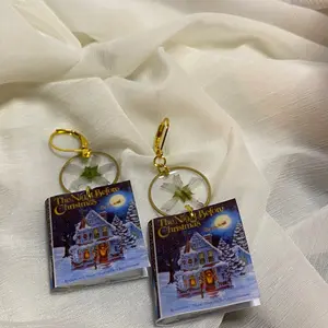 Christmas book earrings with real flowers