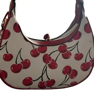 Miss Cherry Handbag with Vibrant Red Cherry Design and Gold Accents