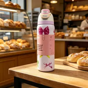 32oz Owala "Girlhood"-Free Sip Limited Edition UO Exclusive Multicolor Pink Bows