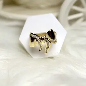 Beautiful Bow Ring Gold Laminated Elegant Style with Sparkling Stones for Everyday Wear or Special Occasions