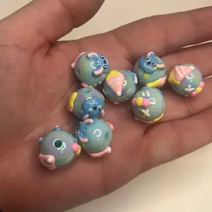 10pk 16mm blue guy hand painted beads.
