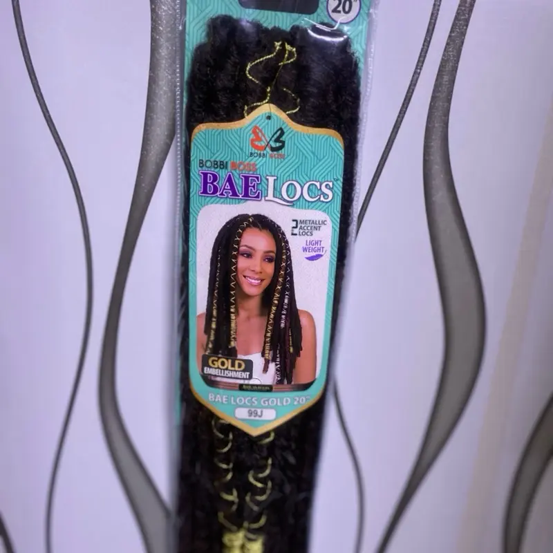 Bobbi Boss Bae Locs Gold 12" are the trendiest crochet hair locs around. This crochet hair with soft and natural like texture, includes two silver accent threaded locs for the most versatile