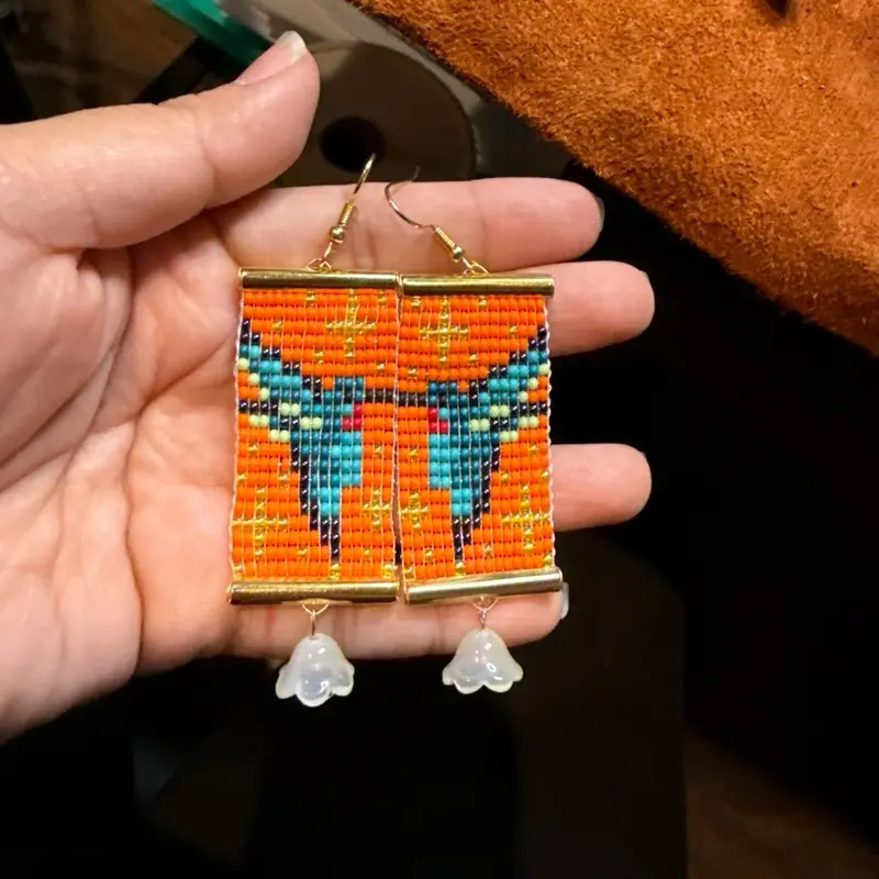 Hummingbird Native Made Beaded Earrings with Vibrant Orange and Blue Beadwork and Delicate Bell Charms