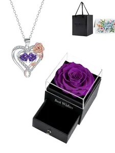 Double Diamond Rose Heart Premium necklace crafted with heart & rose motifs and red ruby inlays. Paired with a purple preserved rose gift box, ideal for birthdays, Mother’s Day, Valentine’s Day and daily holiday gifting.