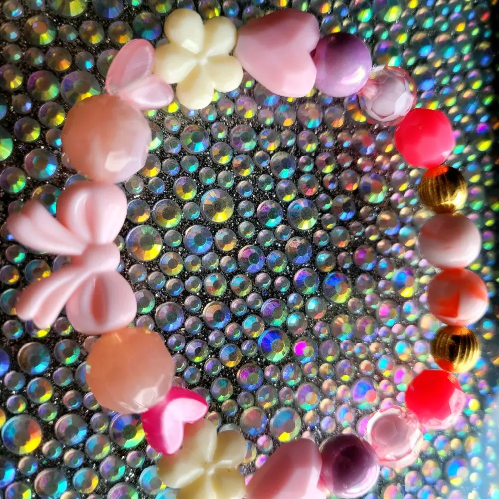 Pretty in Pink Bow Bracelet with Colorful Beads and Flower Designs