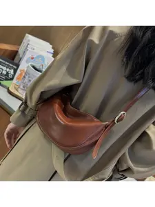 Genuine Leather Women's Bag 2026 New Fashionable Underarm Dumpling Bag Retro Commuter Cowhide Shoulder Crossbody Bag Women's Saddle Bag Adjustable Crossbody Shoulder