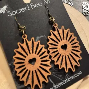 Sacred Bee Art Wood Earrings with Heart Design and Sunburst Pattern