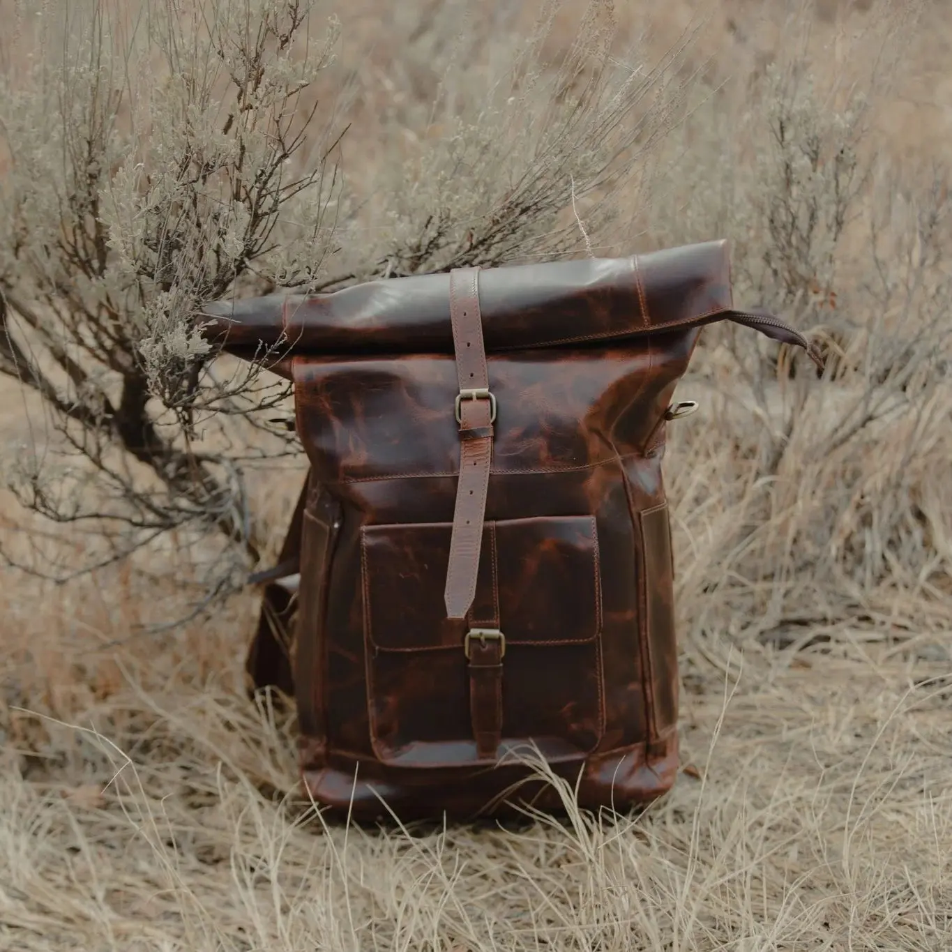 Kobuk Leather Backpack - Top-Grain Leather, Padded Interior, Adjustable Straps, Zippered Opening, 40L Capacity, 13" & 15" Laptop Sleeve, Brass Hardware