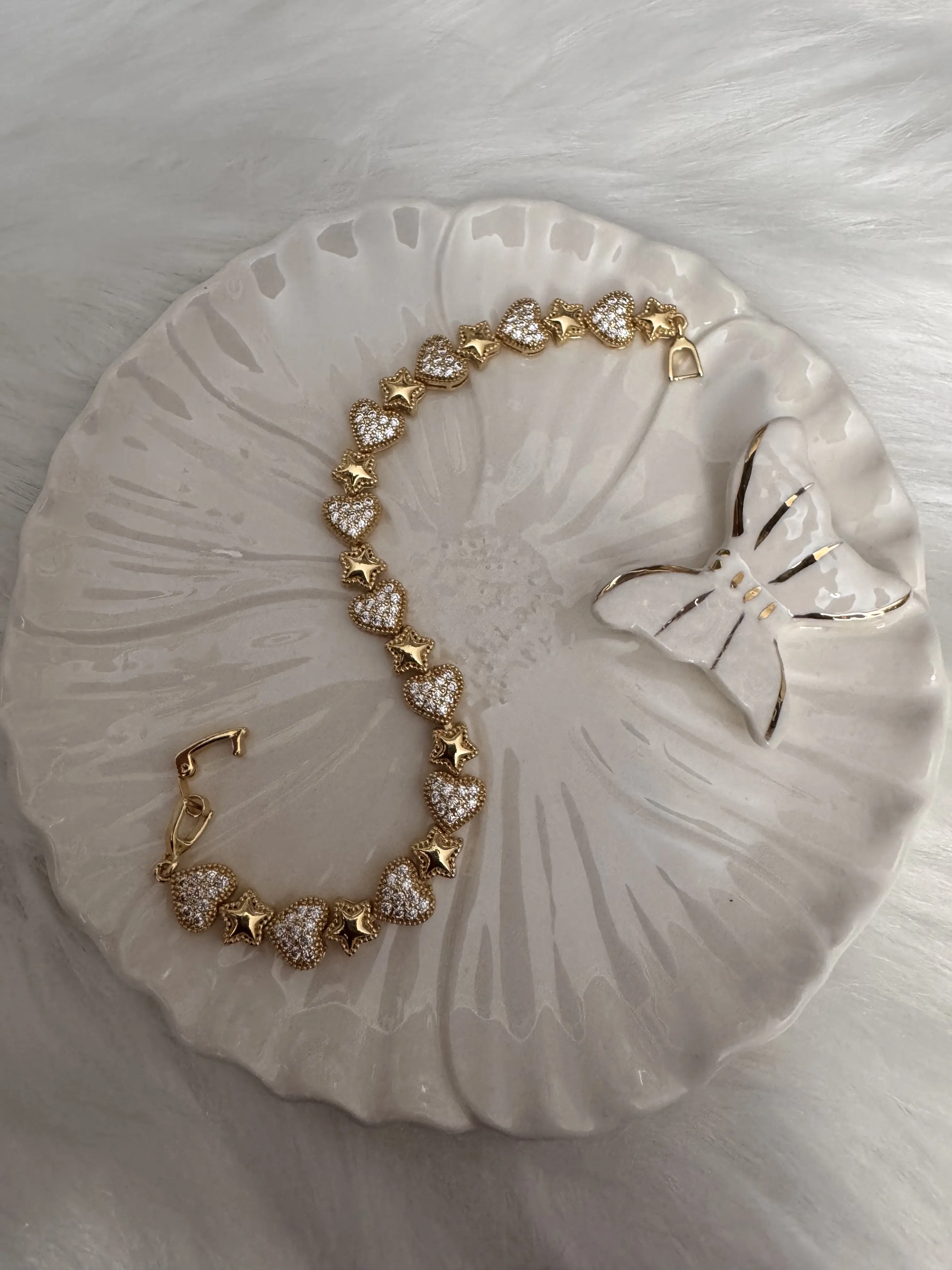 Gold plated heart & star charm bracelet