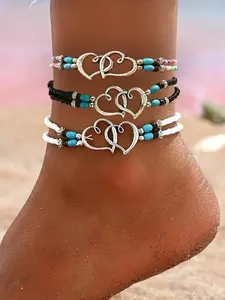 Summer Beach Bohemian-Style Double-Heart Anklet—a trendy, elastic-fit design featuring charming shell and starfish accents. This handcrafted chain jewelry serves as an elegant and versatile fashion accessory, perfect for everyday wear.